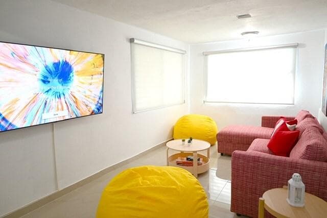 Family room with Tv and table games